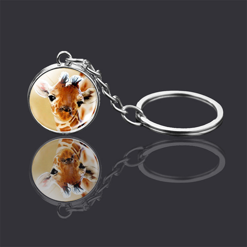 Adorno de llavero de bola de cristal de doble cara con animal