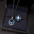 Juego de anillos y colgante de topacio azul de Londres con incrustaciones de plata 925. Se entrega un juego.