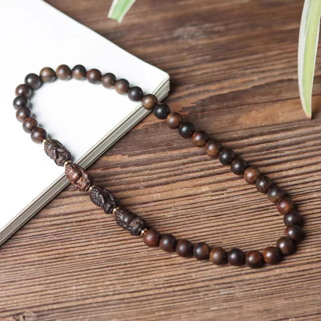 Double Circle Bracelet With Four Buddha Carved From Agarwood