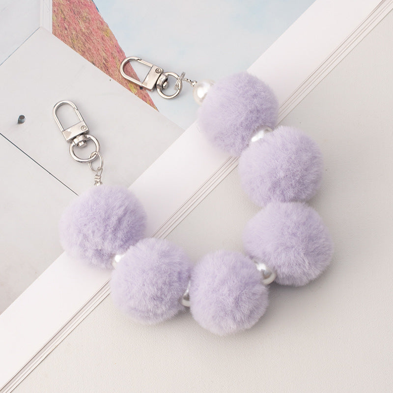Cordón de peluche para teléfono móvil con bola de pelo