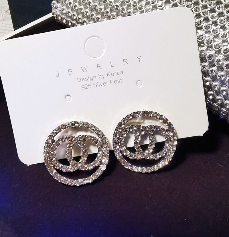 Aretes redondos de diamante completo