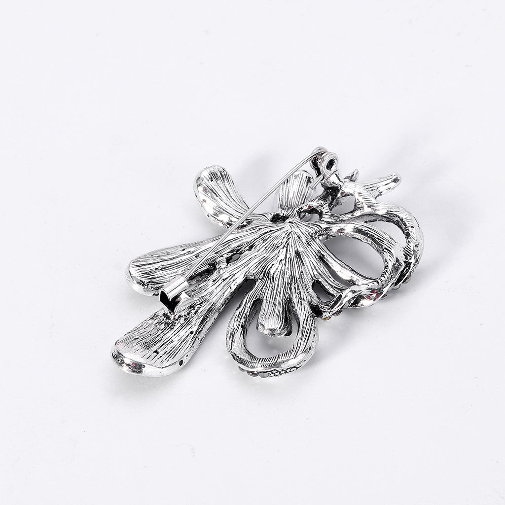 Broche de lazo floral vintage de moda