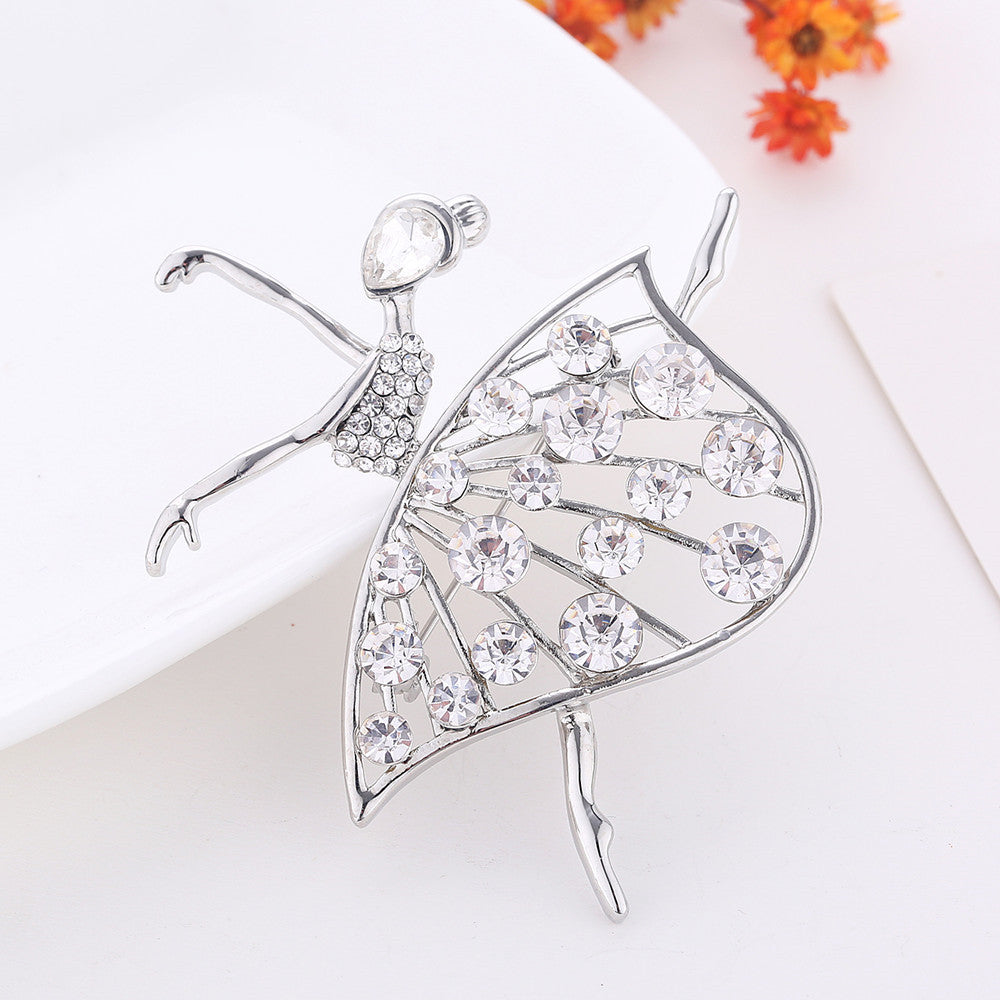 Broche de ropa de moda y elegante frasco de perfume