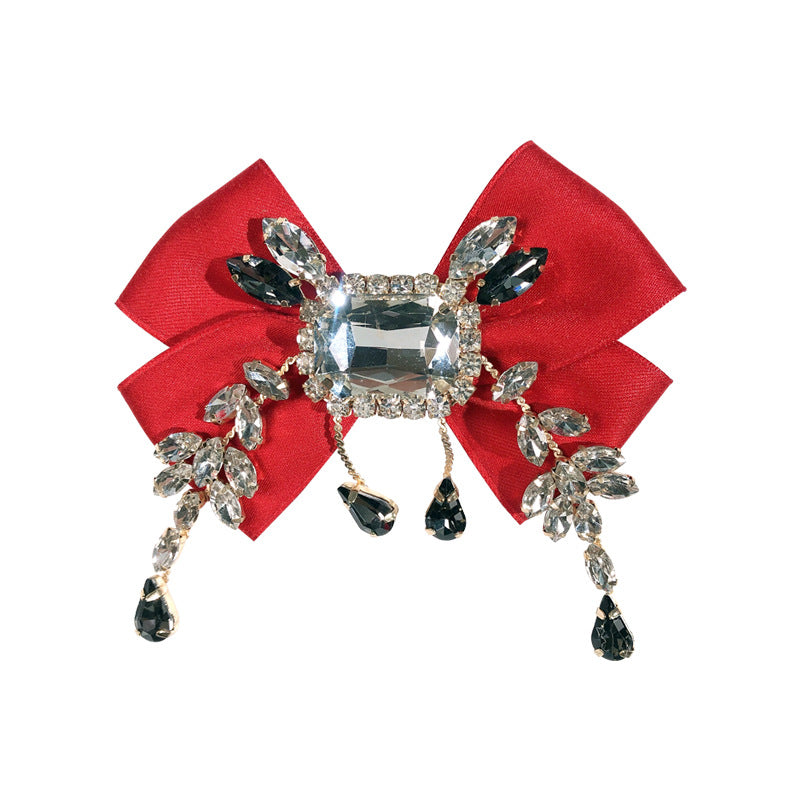 Broche de lazo británico vintage sólido de diamantes de imitación