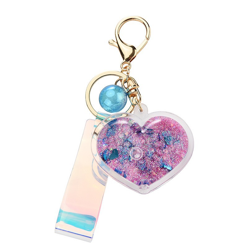 Llavero de corazón de arenas movedizas de aceite creativo