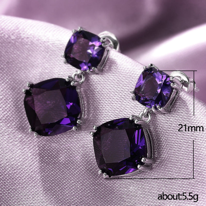 Elegantes aretes cuadrados de circonita morada misteriosa