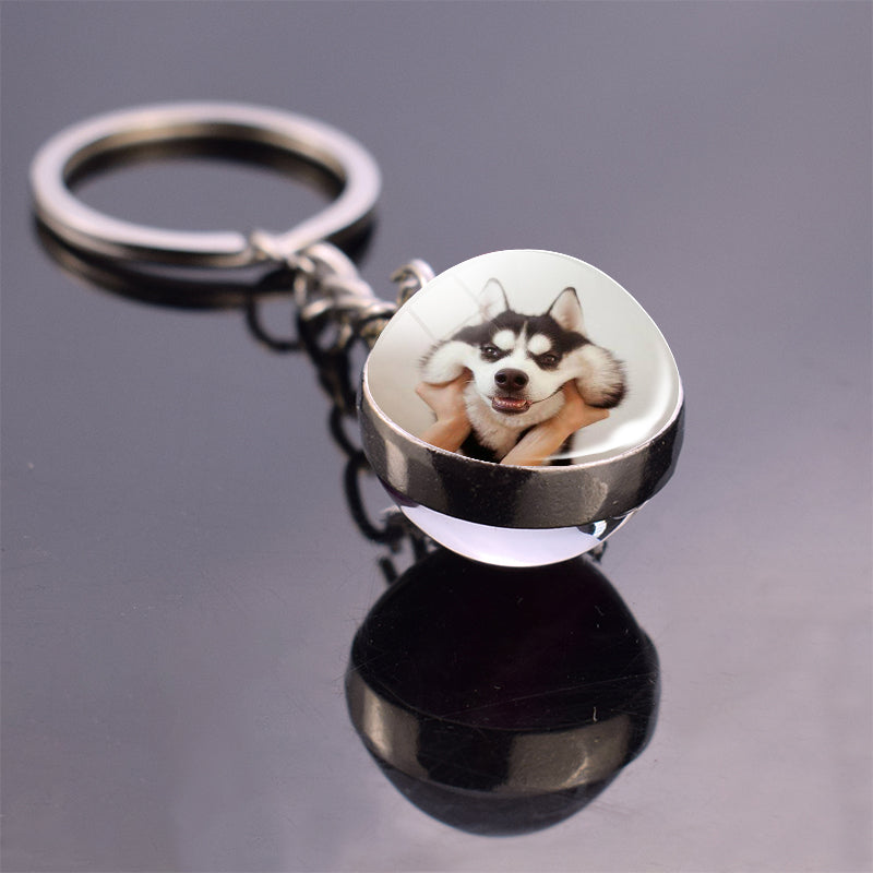 Colgante de bola de cristal con diseño de animales y llavero luminoso de moda