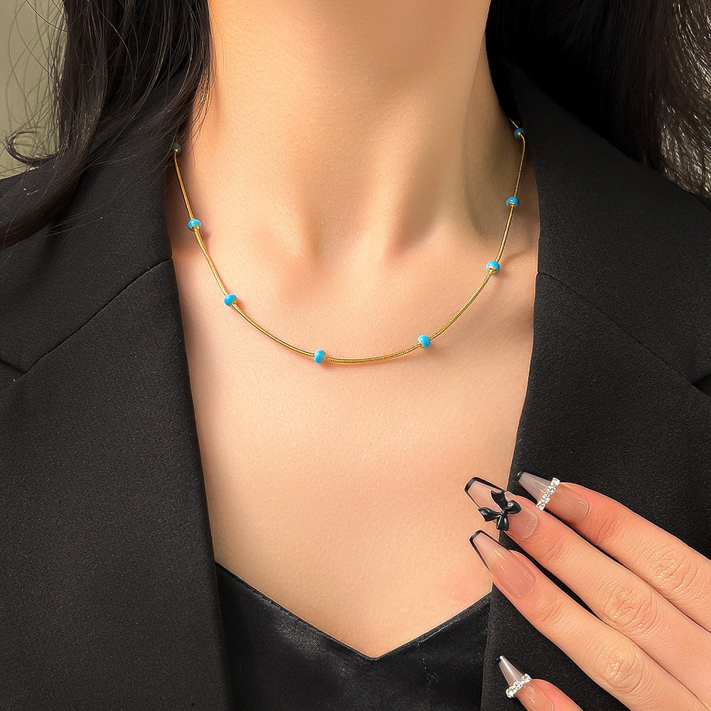 Collar de acero de titanio con bola esmaltada para mujer con un sentido incoloro y avanzado, accesorios de cadena de cuello simples y versátiles