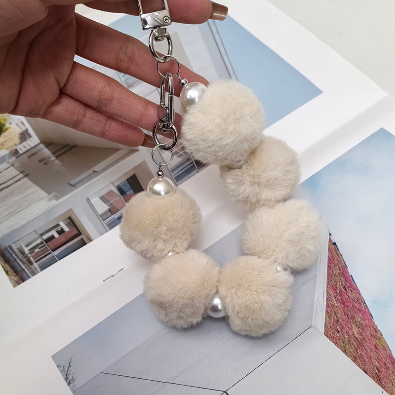 Cordón de peluche para teléfono móvil con bola de pelo