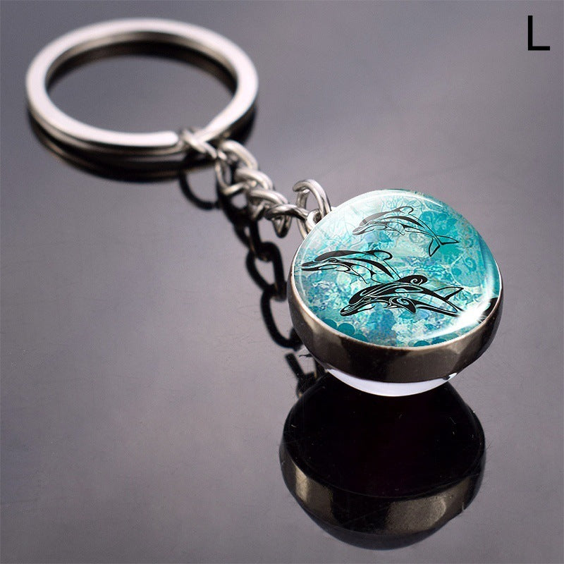 Llavero de bola de cristal con estrella de mar tortuga y animal divertido