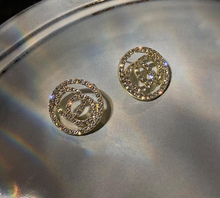 Aretes redondos de diamante completo