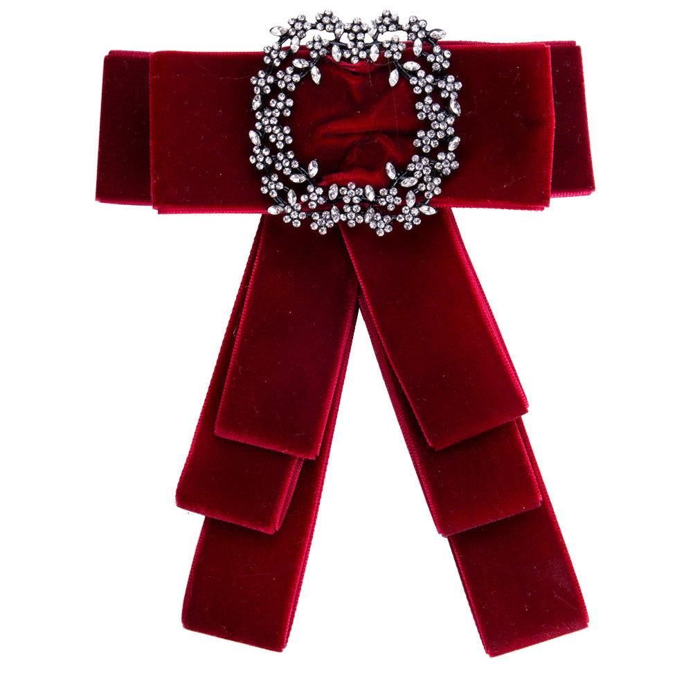 Broche de lazo trenzado de terciopelo dorado exagerado