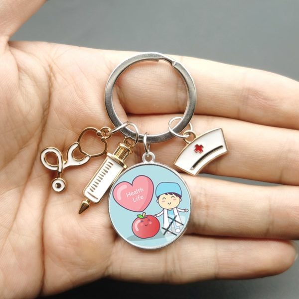 Llavero de jeringa y estetoscopio para personal médico