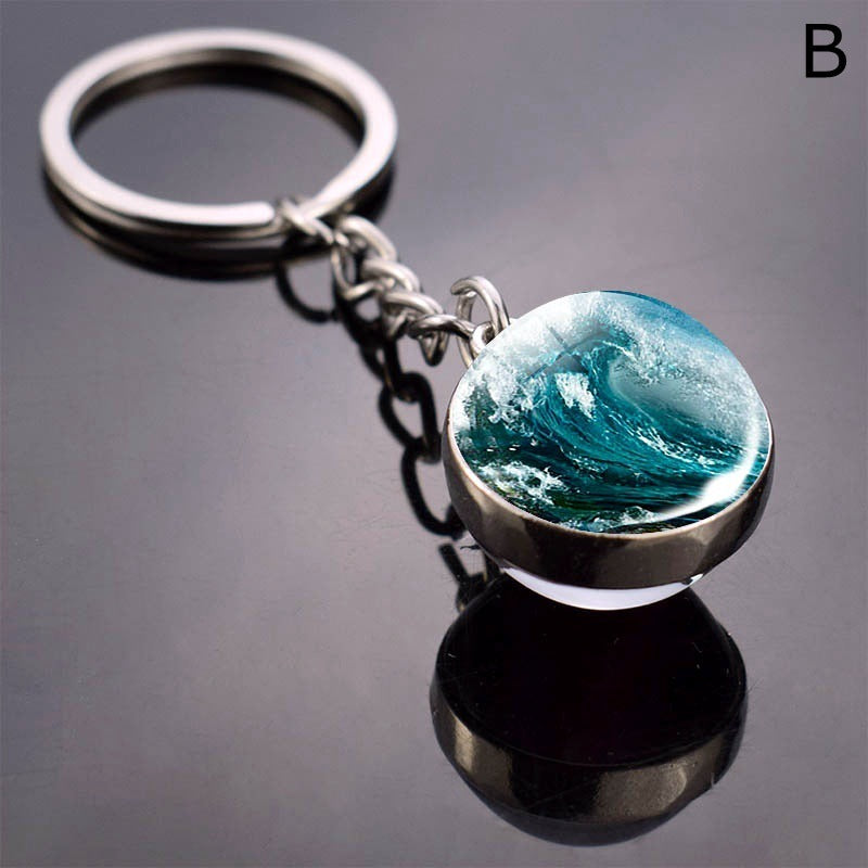 Llavero de bola de cristal con estrella de mar tortuga y animal divertido