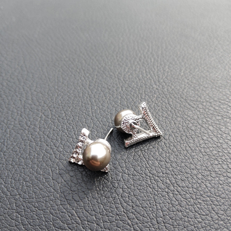 Pendientes triangulares en forma de V