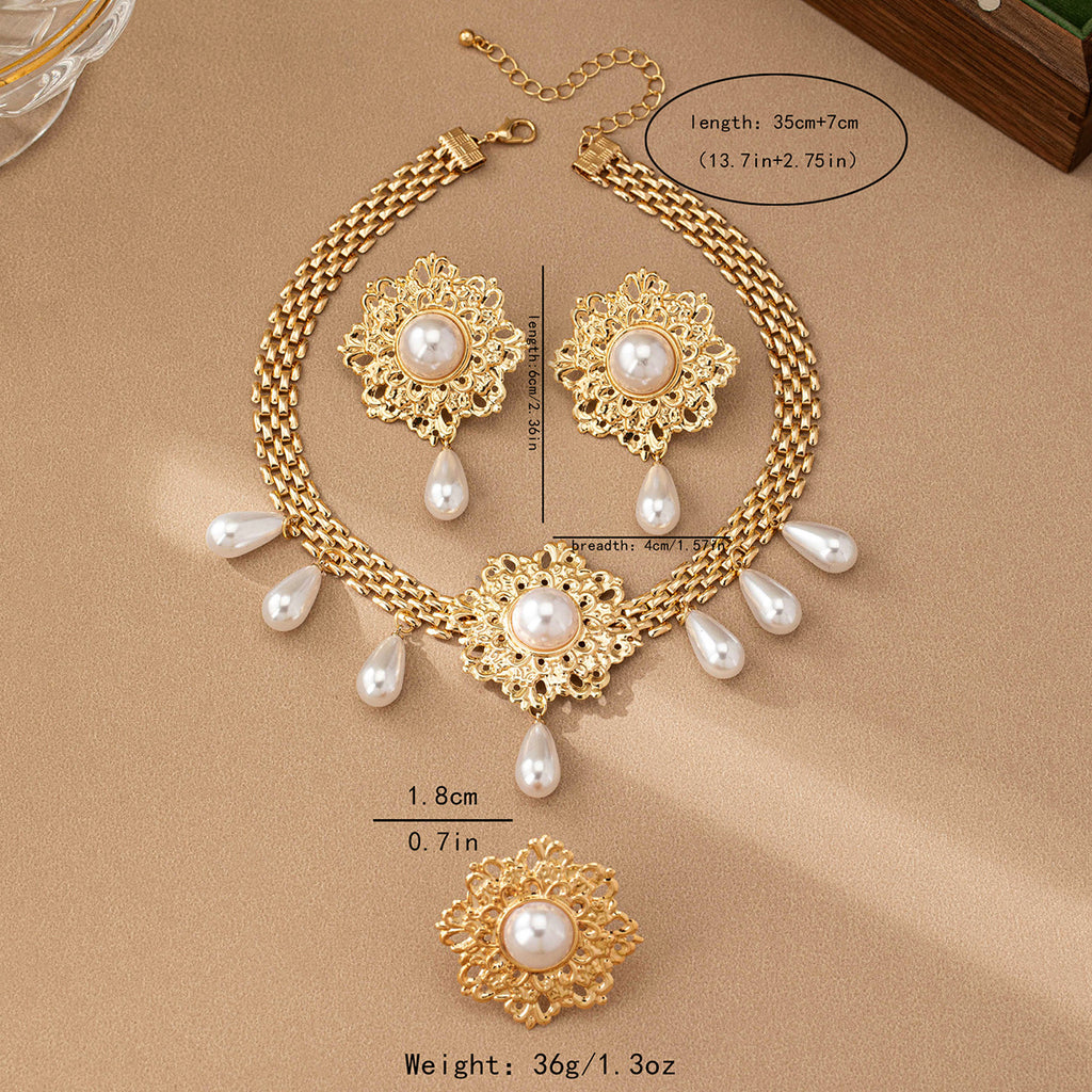 Französische Retro Aushöhlen Blume Perle Quaste Halskette Ohrstecker Ring