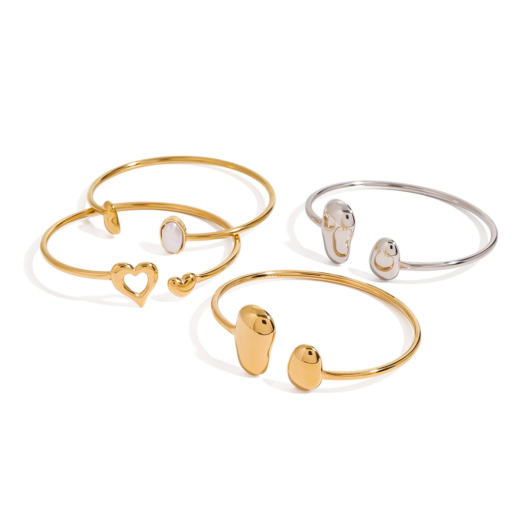 Pulsera abierta de acero inoxidable con forma de gota de agua irregular