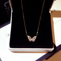 Collar con colgante de mariposa