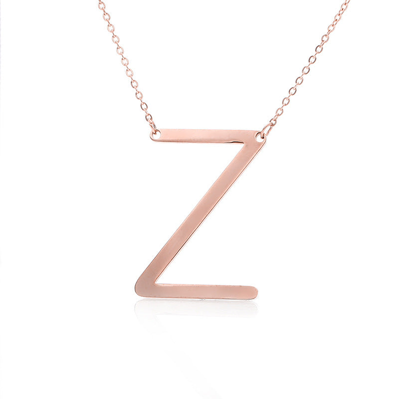 Fabuloso collar con colgante de letra inicial de acero inoxidable chapado en oro rosa