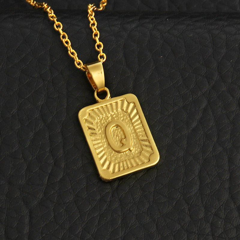 Gold letter necklace