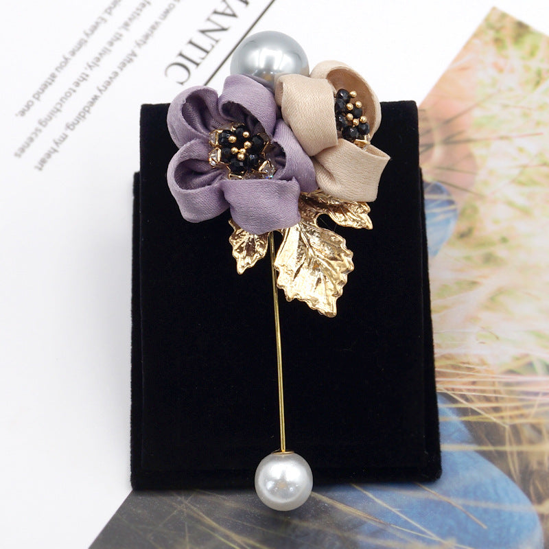 Broche de flor de perla