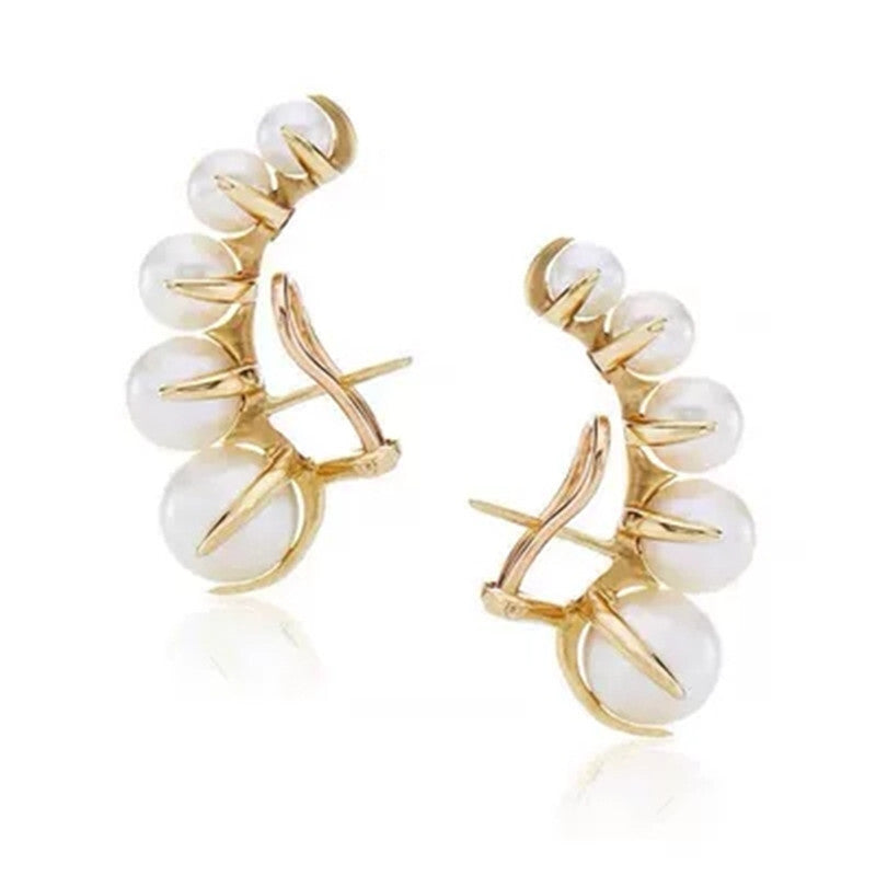 Pendientes con broche de Michel Lobe Wrap