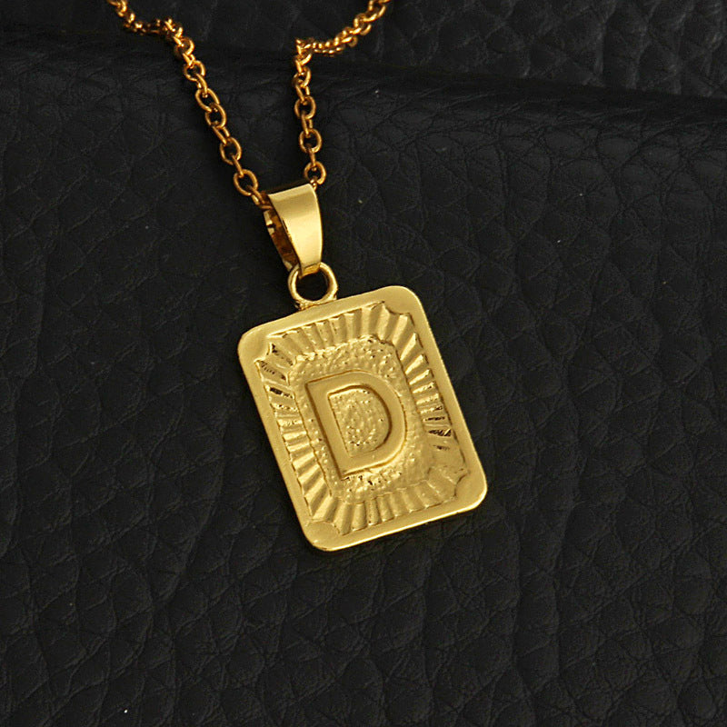 Gold letter necklace