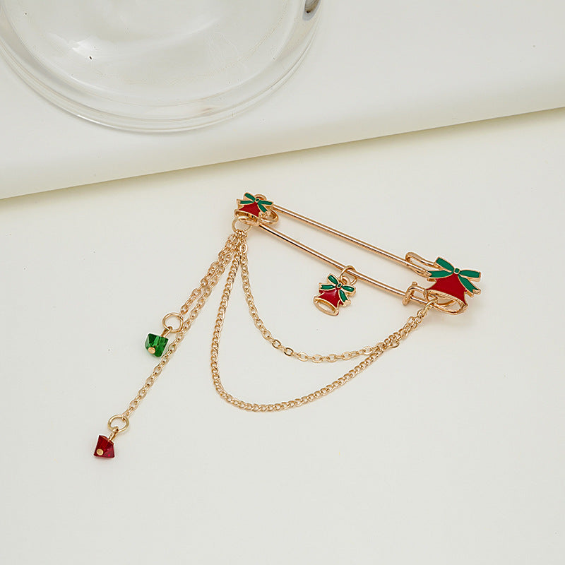 Broche de moda con cadena y cascabel