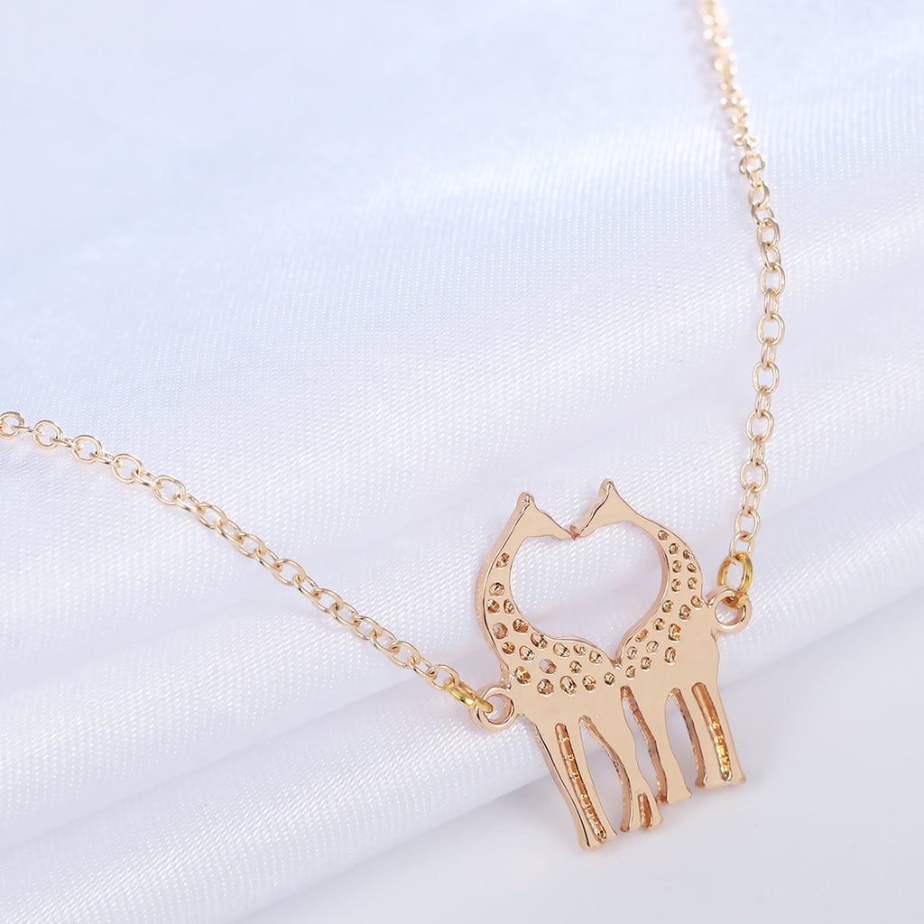 Vergoldete Silberarmbänder mit Liebesherz-Giraffen