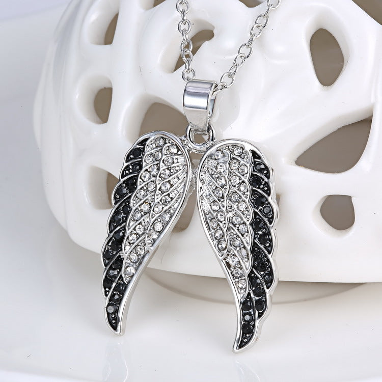 Rhinestone wing necklace