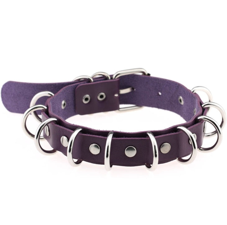 Collar doble de cuero estilo punk exagerado con múltiples aros metálicos