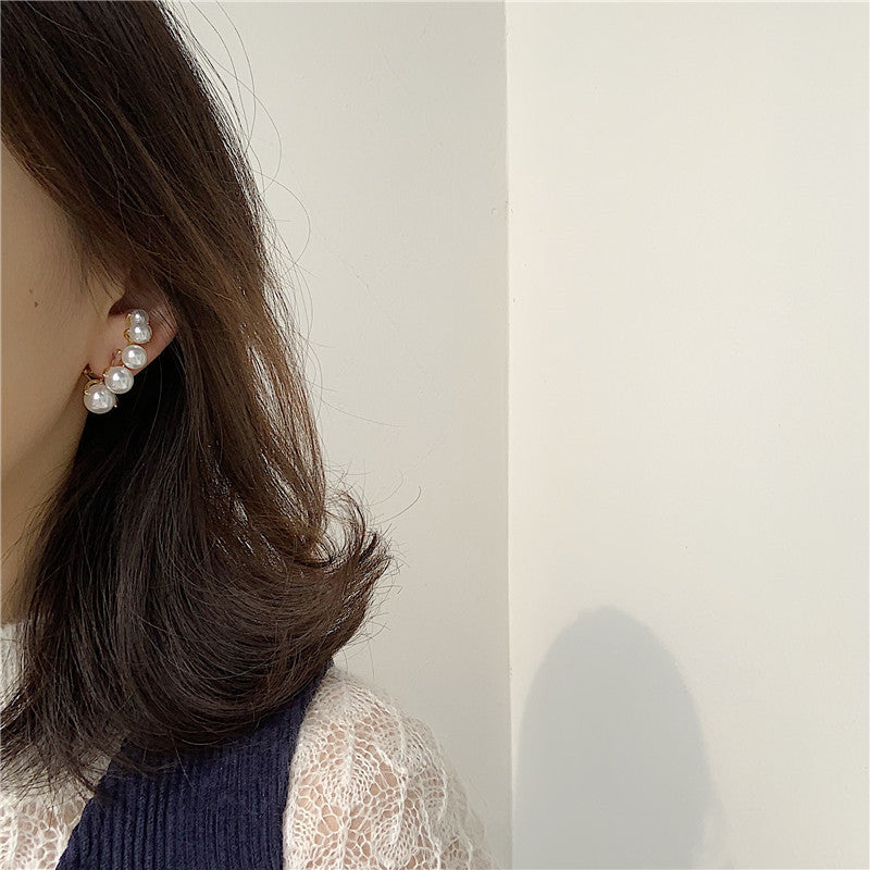 Pendientes con broche de Michel Lobe Wrap
