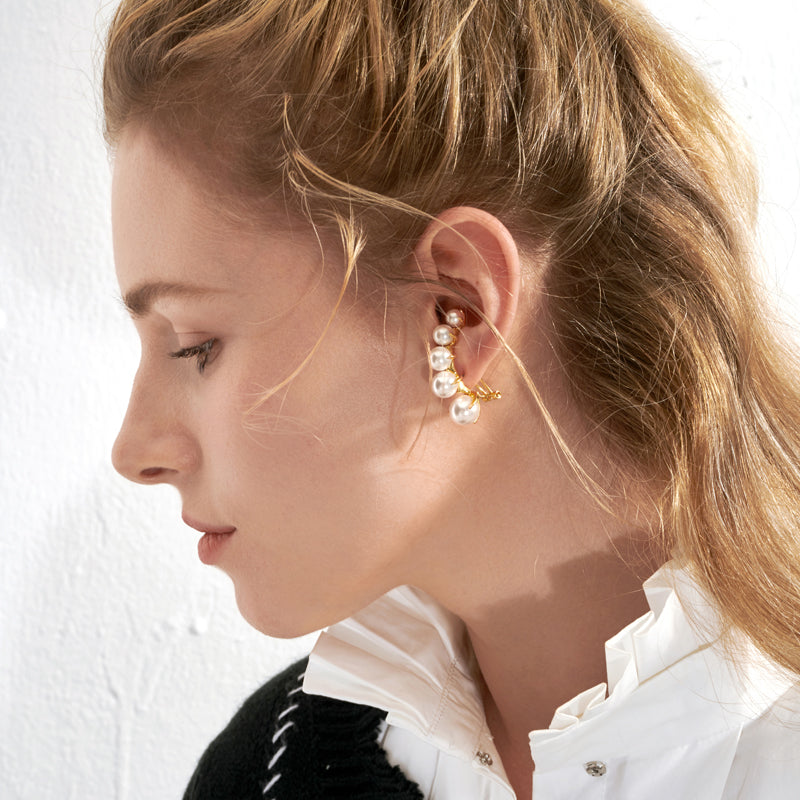 Pendientes con broche de Michel Lobe Wrap