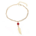 Tobillera de plumas con cuentas de cristal