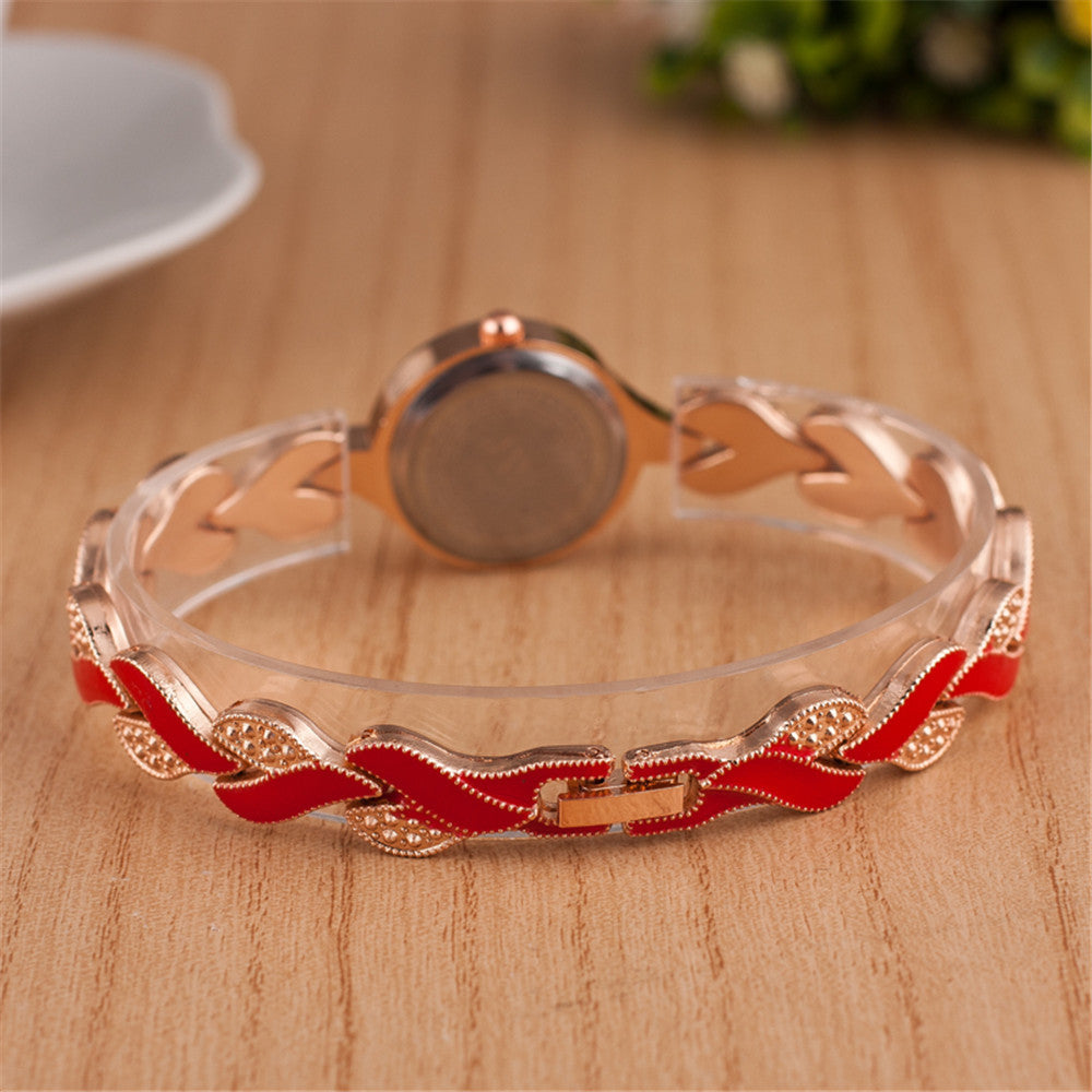 Reloj de pulsera de cuarzo con hojas