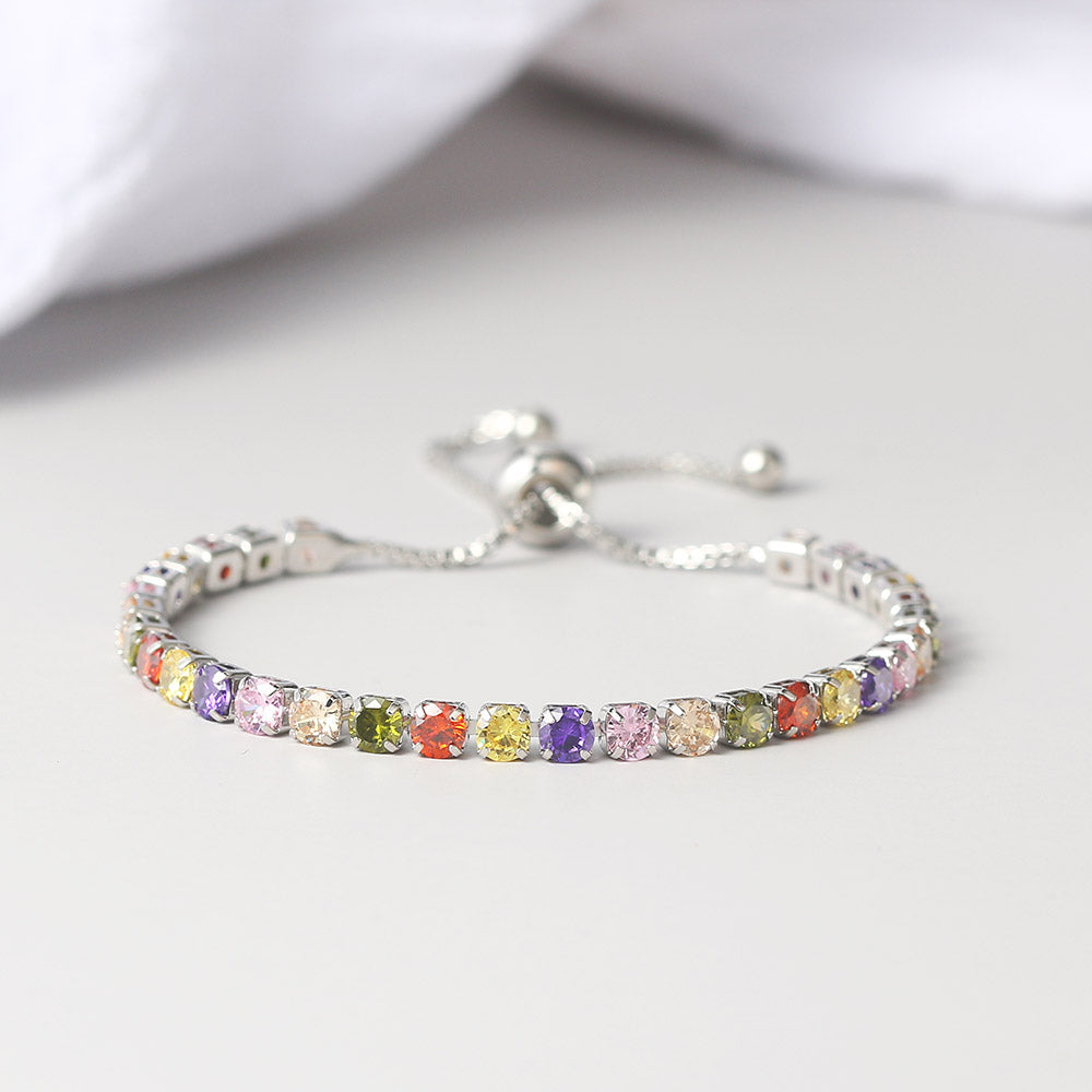 Pulsera de tenis de una fila con circonitas redondas y diamantes completos