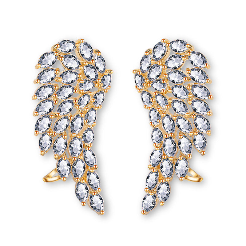 Pendientes de tuerca de alas de ángel con circonita cúbica brillante para mujer, joyería de boda de moda en color oro blanco