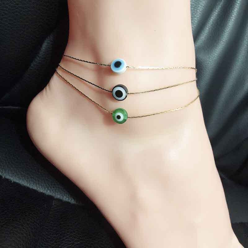 Tobillera de cadena fina de metal dorado con diseño de ojo turco de aleación