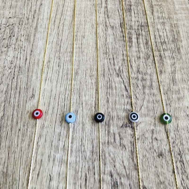 Tobillera de cadena fina de metal dorado con diseño de ojo turco de aleación