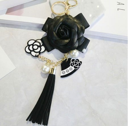 Llavero de borla de cuero sintético estilo coreano, colgante para bolso con diseño de camelia
