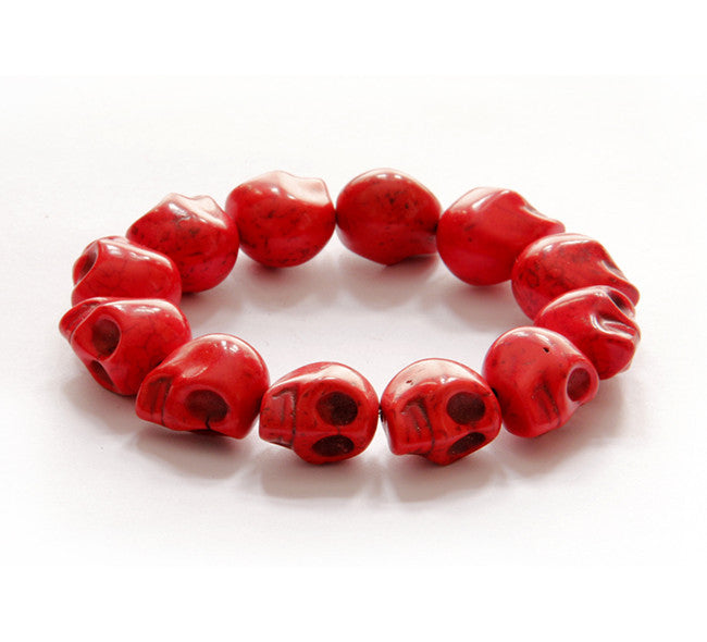Brazalete de turquesa sintética con calaveras