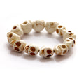 Brazalete de turquesa sintética con calaveras