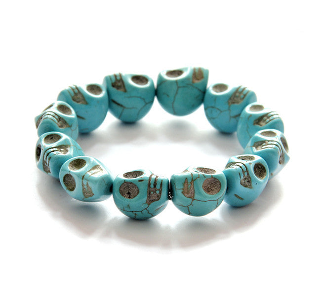 Brazalete de turquesa sintética con calaveras