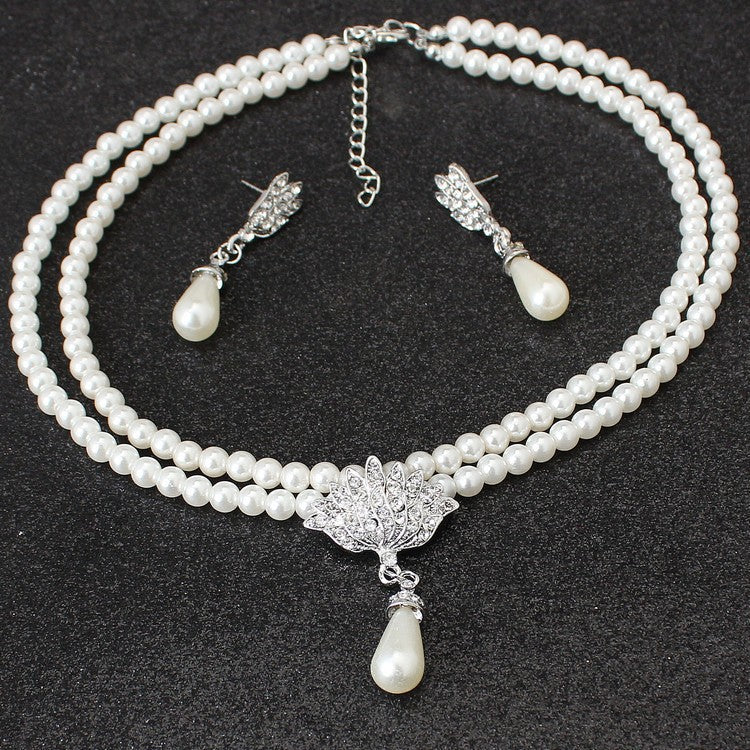 Europäischer und amerikanischer Schmuck Braut Perle Kristall Kurze Schlüsselbein Halskette Set Ohrringe Koreanische Version Temperament