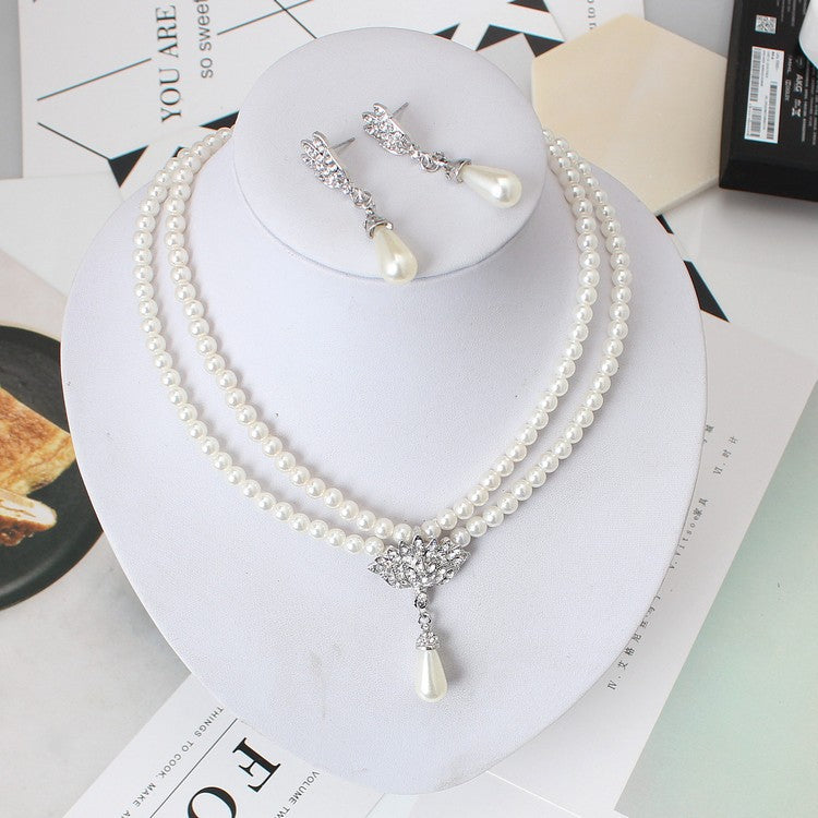 Europäischer und amerikanischer Schmuck Braut Perle Kristall Kurze Schlüsselbein Halskette Set Ohrringe Koreanische Version Temperament