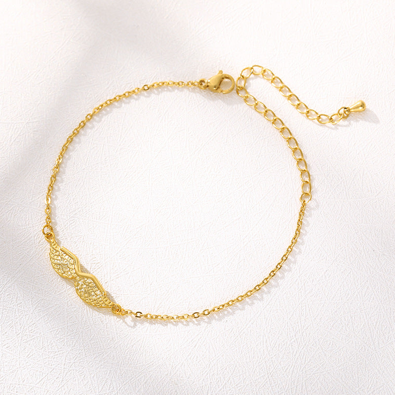Pulsera de oro con dije de alas de ángel para mujer