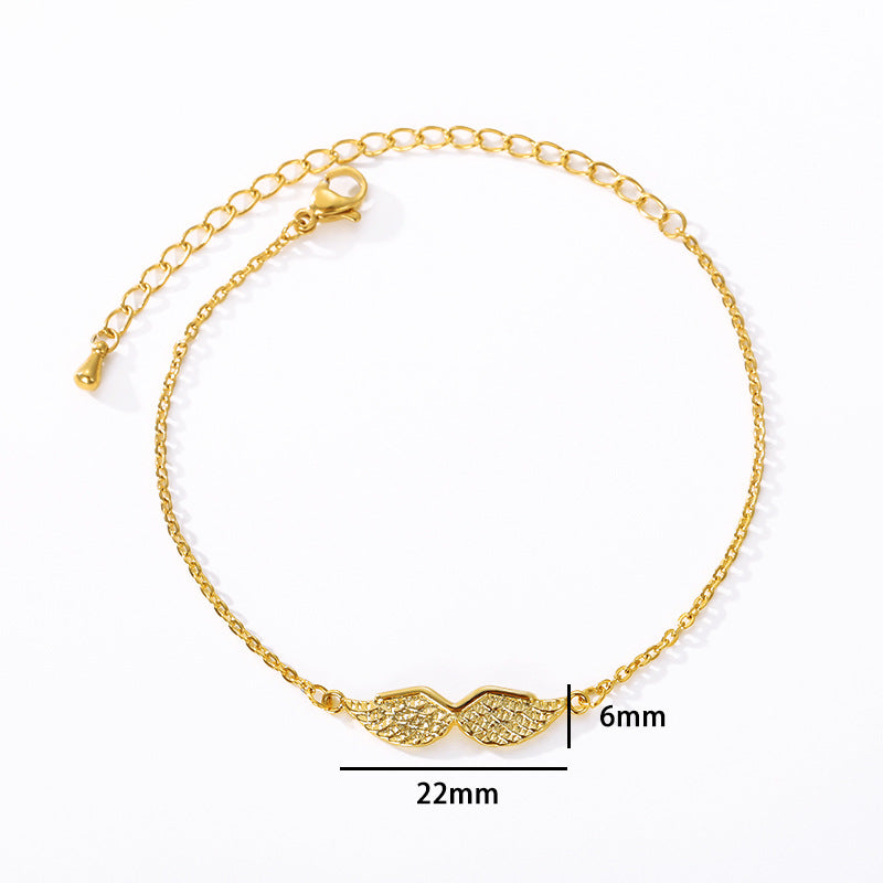 Pulsera de oro con dije de alas de ángel para mujer