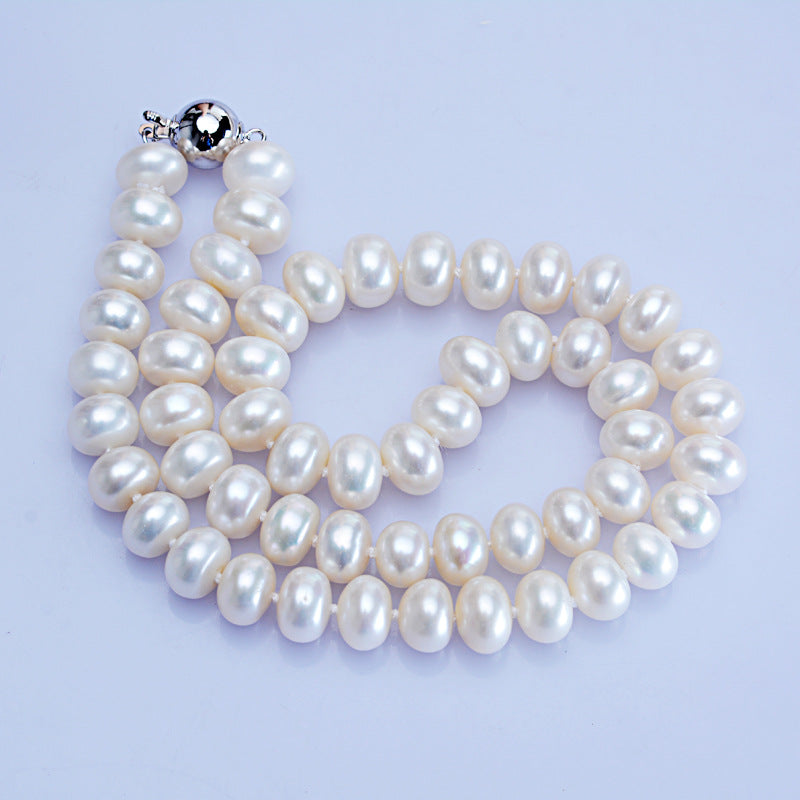 Dailan Jewelry Collar de perlas de agua dulce de 10-11 mm, redondo, tipo pan al vapor, con botón de bola de luz fuerte, venta al por mayor de fábrica de joyería