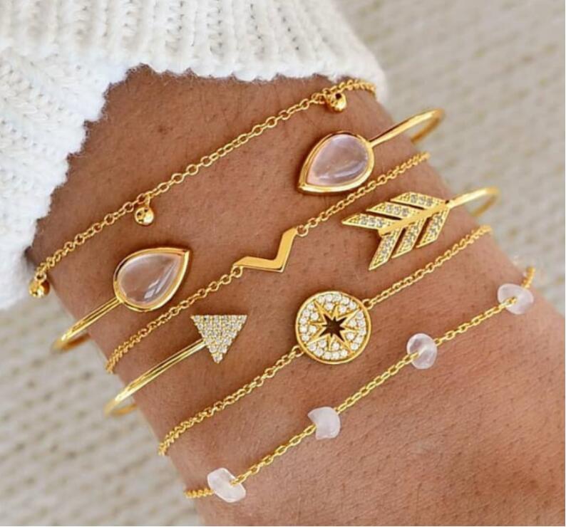 Europa Estados Unidos Adornos de mano populares transfronterizos Nuevo conjunto de pulseras de seis piezas en forma de V de ojo de gato y piedra rota en stock