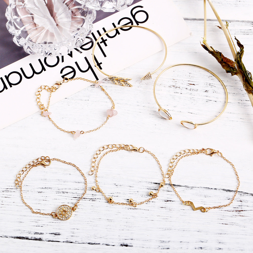 Europa Estados Unidos Adornos de mano populares transfronterizos Nuevo conjunto de pulseras de seis piezas en forma de V de ojo de gato y piedra rota en stock